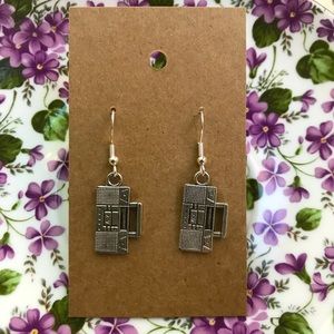 Silver tone dangly boombox earrings